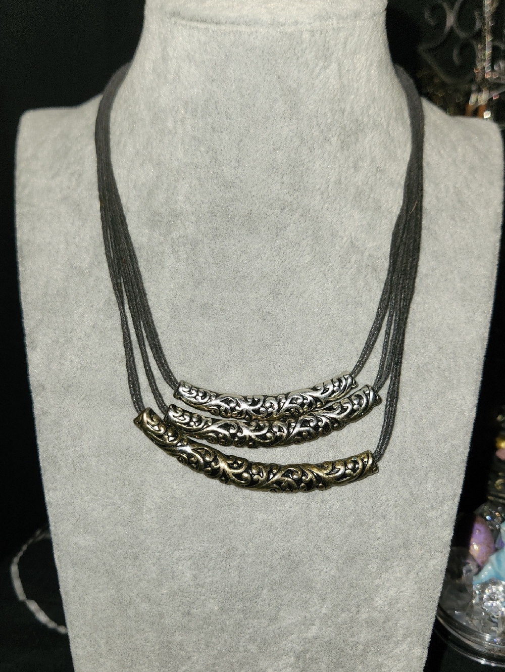Multi-Strand Black Cord Necklace With Sliver Tubes